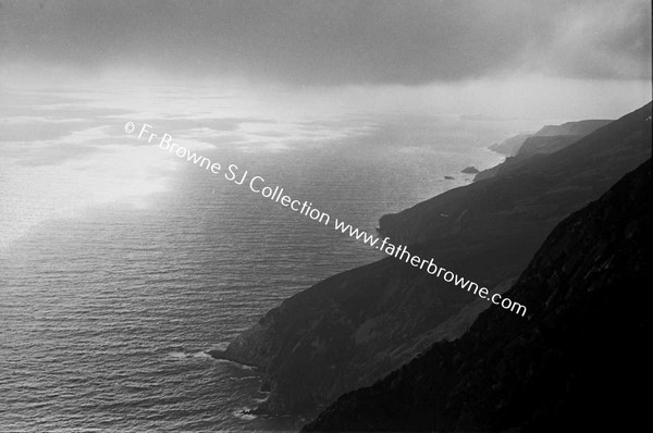 SLIEVE LEAGUE SUNLIGHT ON SEA THROUGH MIST AND CLIFFS